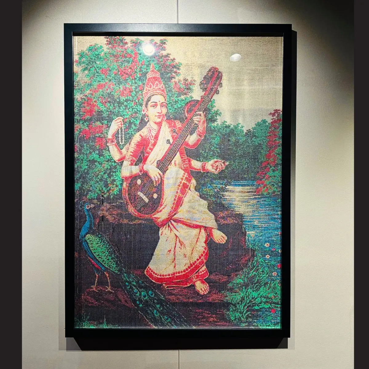 raja-ravi-varma-s-saraswati-masterpiece-series-kanjivaram-silk-artwork.webp